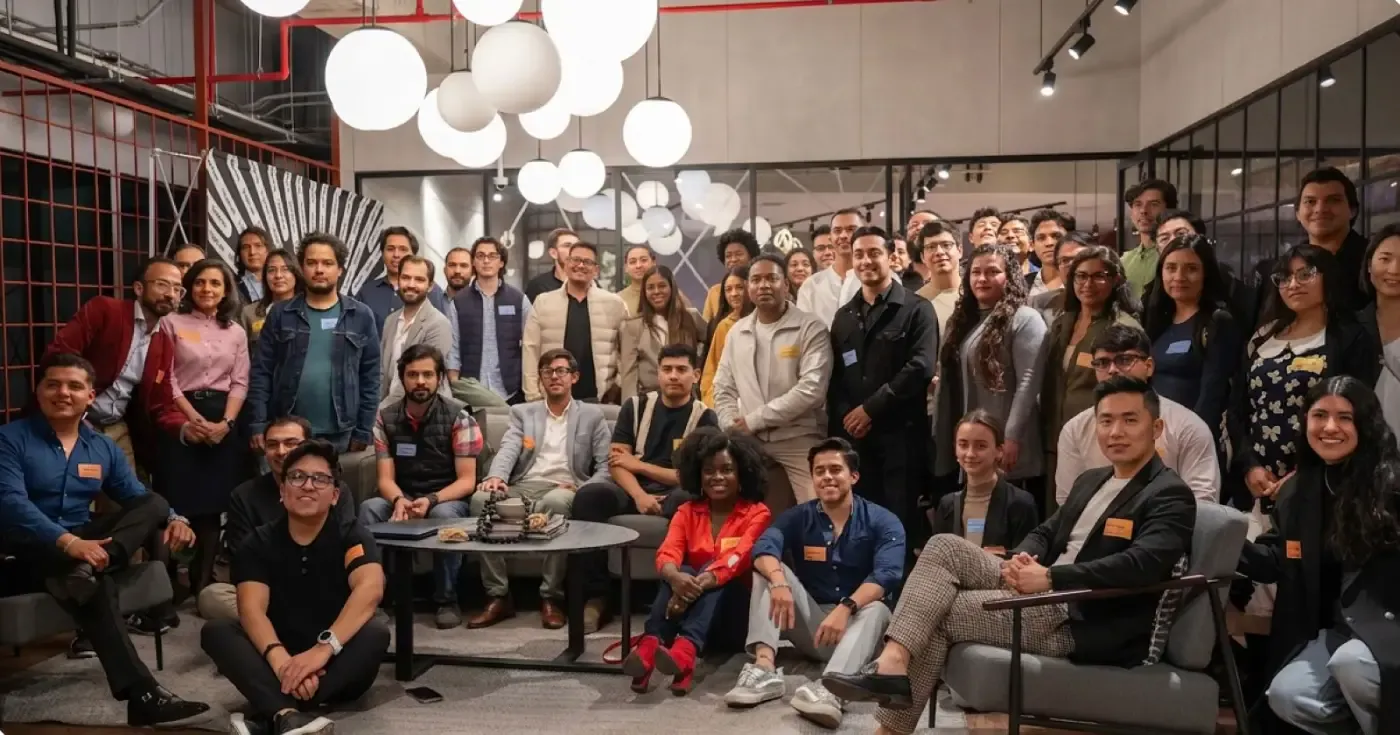 TripleTen graduates and staff at a community meetup